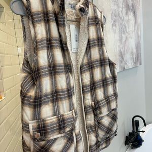 Super cute and cozy plaid vest